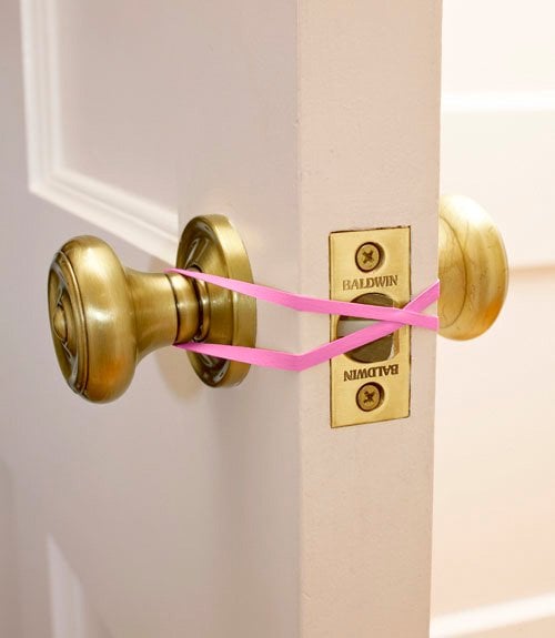 4. RUBBER BAND TO SMOOTH YOUR WAY THROUGH THE DOOR