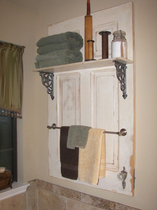 11. CREATE STORAGE FOR YOUR BATHROOM USING AN OLD DOOR