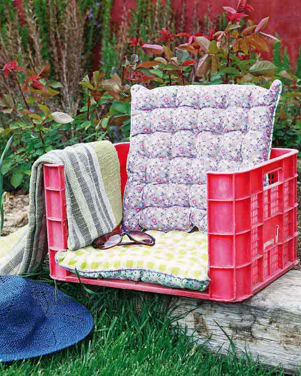 16. old plastic crate used as a cozy chair for your little one