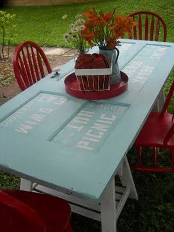 23. Use an old door as a garden table