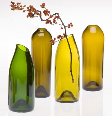 Cut bottles and use them as modern flower vases