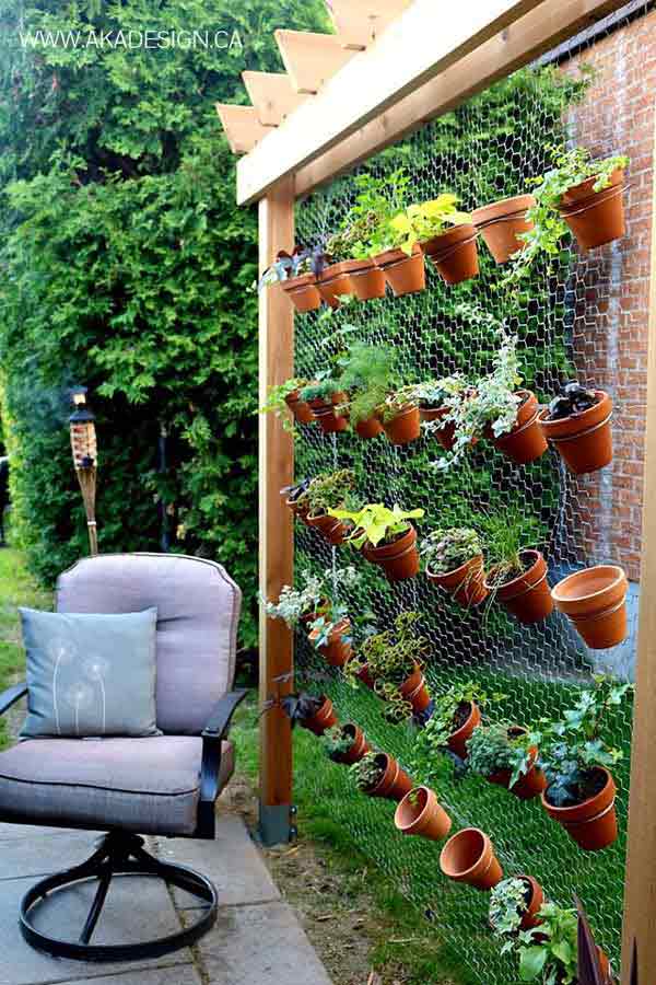 26 Beautiful Simple and Inexpensive Garden Projects Realized With Clay Pots homesthetics decor ideas (17)