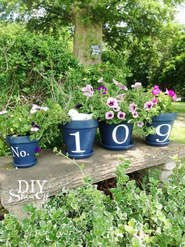 26 Beautiful Simple and Inexpensive Garden Projects Realized With Clay Pots homesthetics decor ideas (3)