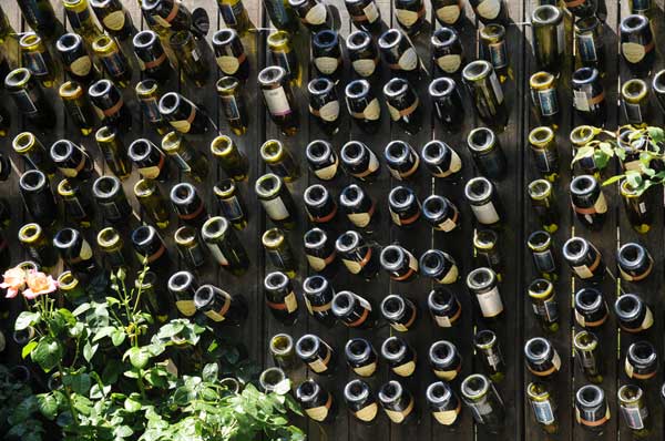 6. DENSE AND BEAUTIFUL GLASS BOTTLE FENCE