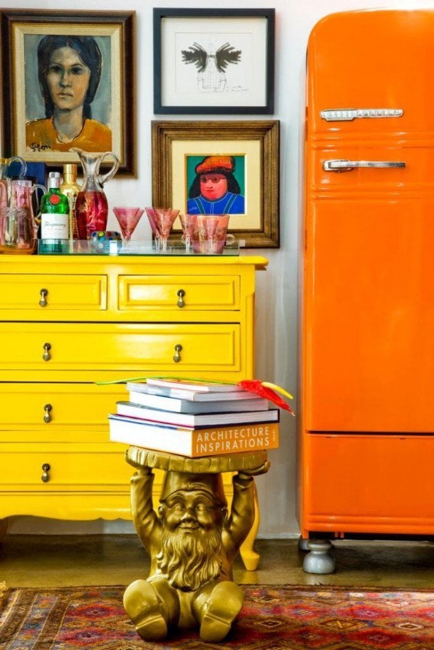 #12 Apothecary Table Complementing a Beautiful Orange Fridge