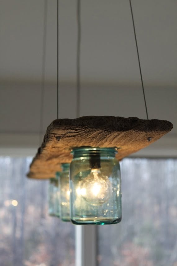 12.Recycled wooden board holding on to beautiful mason jars