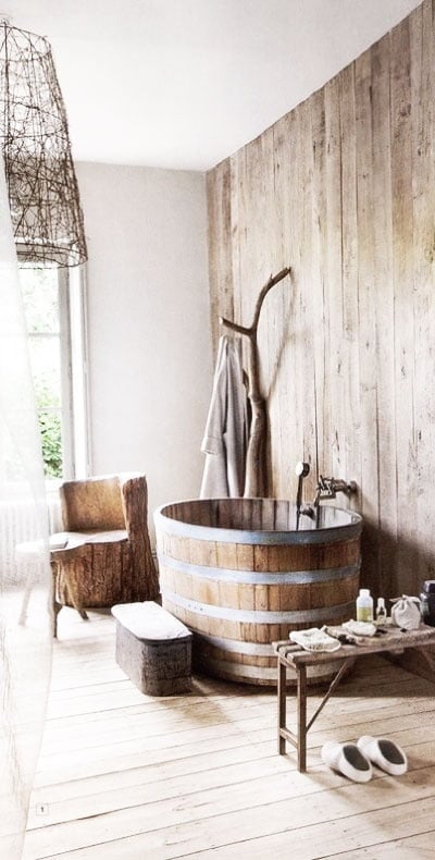 13. Revive old rustic objects like a wine barrel into useful beautiful bathroom items