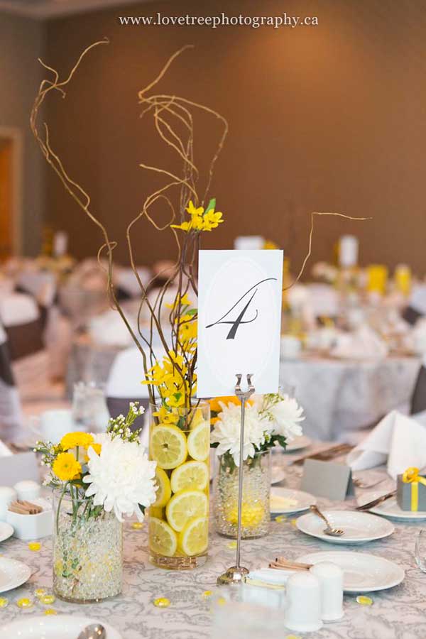 #2 Fresh Yellow Wedding Centerpiece Sculpted by Small Organic Twigs and Freshness