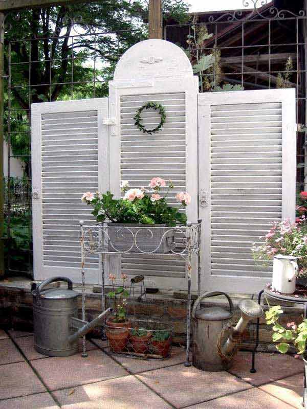 13. OLD SHUTTERS USED AS A PRIVACY SCREEN