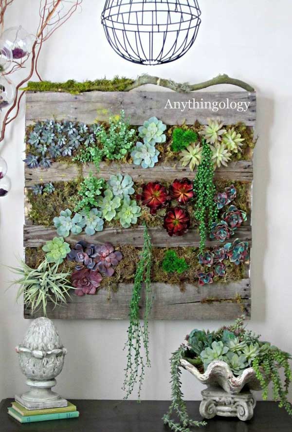 8. TEDIOUS VERTICAL PLANTER HOLDING SUCCULENTS REALIZED OUT OF WOODEN PALLETS
