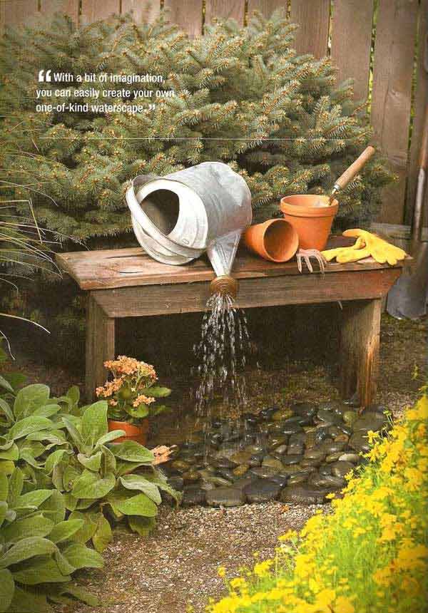 14.BEAUTIFUL SIMPLE WATERING CAN TRANSFORMED INTO SMALL FOUNTAIN