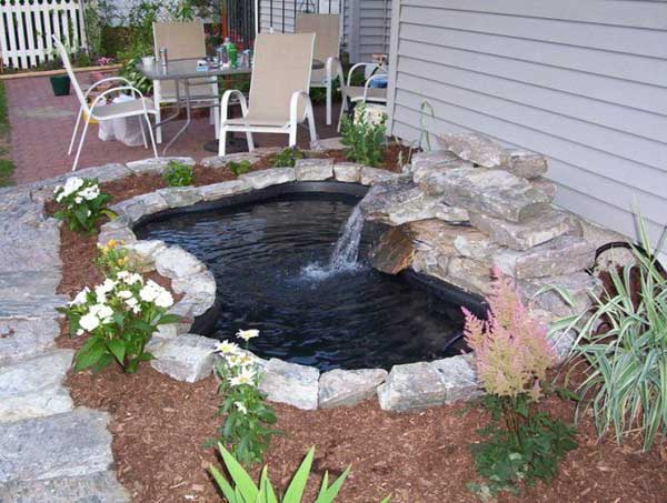 24.KOI POND WITH WATER FOUNTAIN