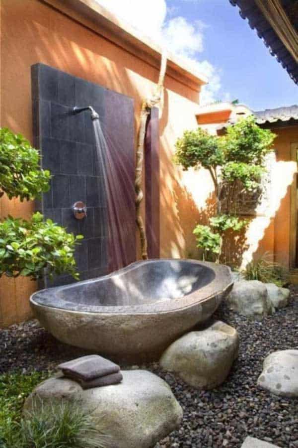 22 Natural Rock Bathtubs Emphasizing Their Spatialities homesthetics cool bathrooms