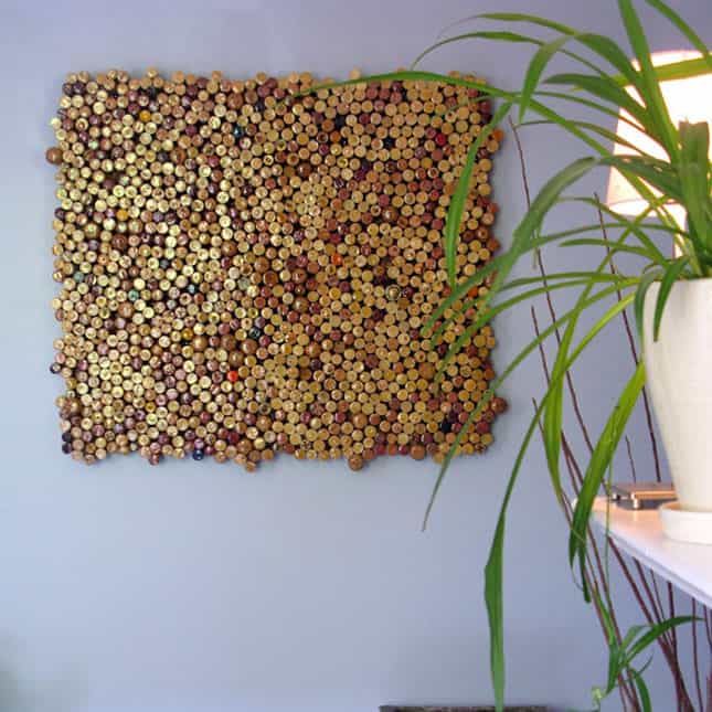 # 19 WINE BOTTLE CORK USED TO MAKE THIS GENIUS WALL ART IDEA