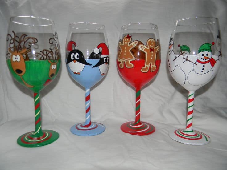 #6 'TIS THE SEASON TO BE JOLLY' WHICH IS WHAT INSPIRED THIS ARTIST TO CREATE THIS WINE GLASS IDEA