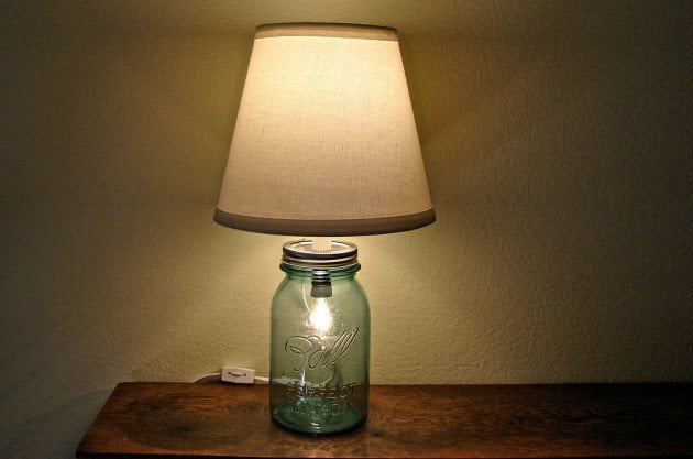 #7 use a vintage blue mason jar to highlight a lamp