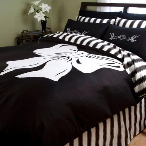 #10 dark colored comforter displaying white bow