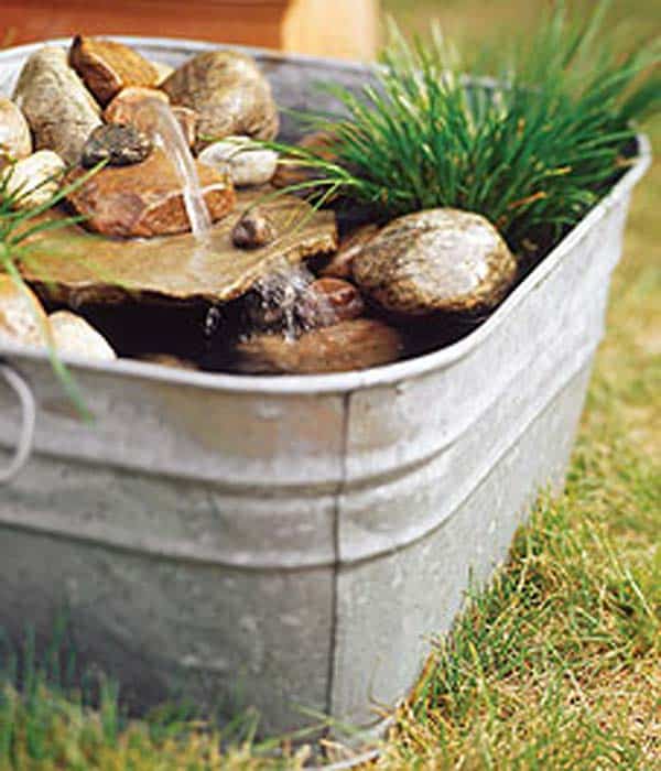 #27 TINY WATER PONDS CAN BE NESTLED IN THE INDUSTRIAL LOOK OF GALVANIZED BUCKETS