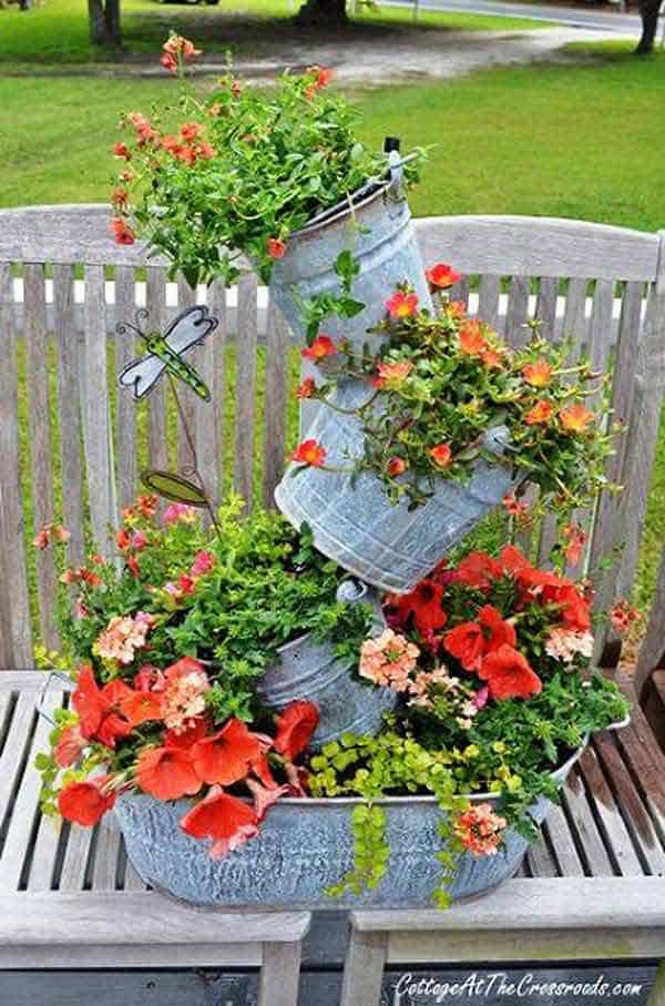 #8 CREATE GRAVITY DEFYING PLANTER INSTALLATIONS OUT OF GALVANIZED BUCKETS