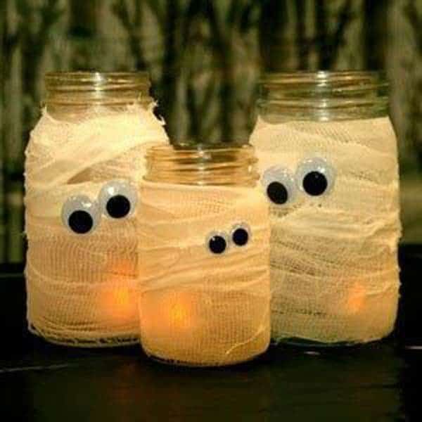 #19 BANDAGED MASON JARS WITH EYES ANIMATED BY CANDLES CAN WORK