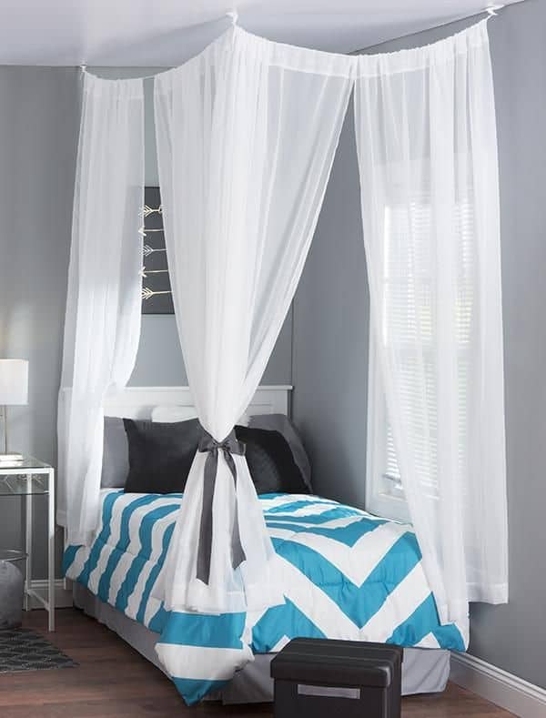 #1 Enclose a small canopy bed with a blue and white stripe comforter and a pure white silk hanging curtain