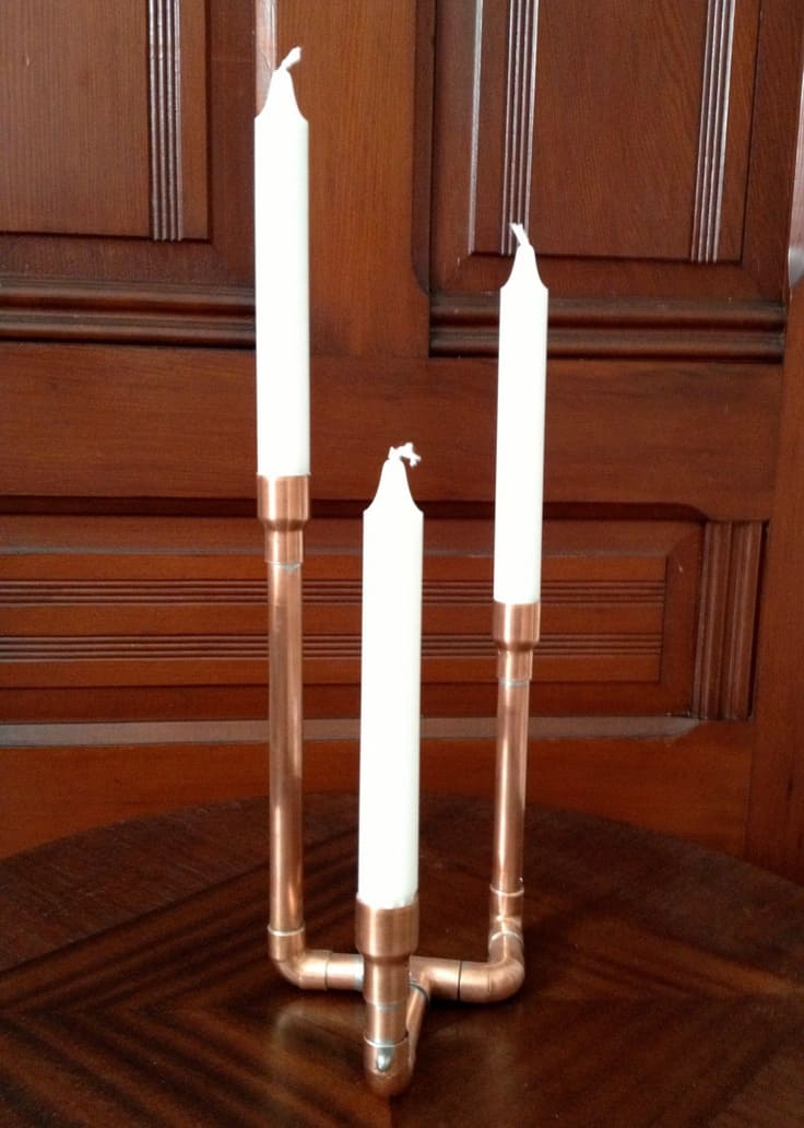 COPPER PIPES CAN SERVE AS CANDLESTICK HOLDERS