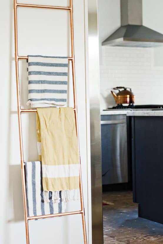 PICTURE HANGING YOUR USED TOWELS ON A COPPER PIPE