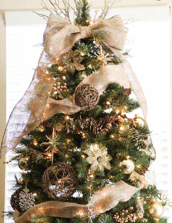 #11 CHRISTMAS TREE DECORATING WITH GOLD AND COPPERY HUES ACCENTUATED BY THE NEUTRAL BALANCED BEIGE BURLAP