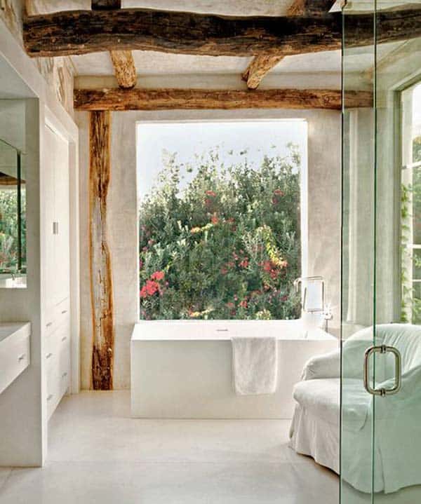 SENSIBLE BATHROOM WITH RAW WOODEN BEAMS AND BEAUTIFUL VIEW