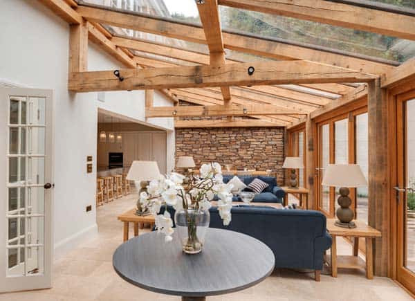 CONSERVATORY WITH MASSIVE WOODEN STRUCTURE AND SKY ROOF