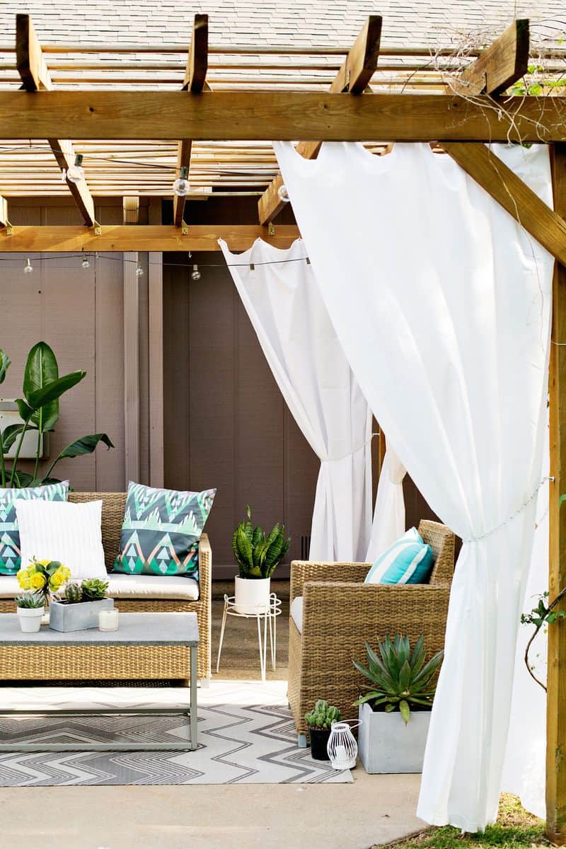 pergola adding privacy through curtains