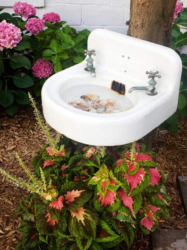 #12 use your old sink to shape a small bird bath