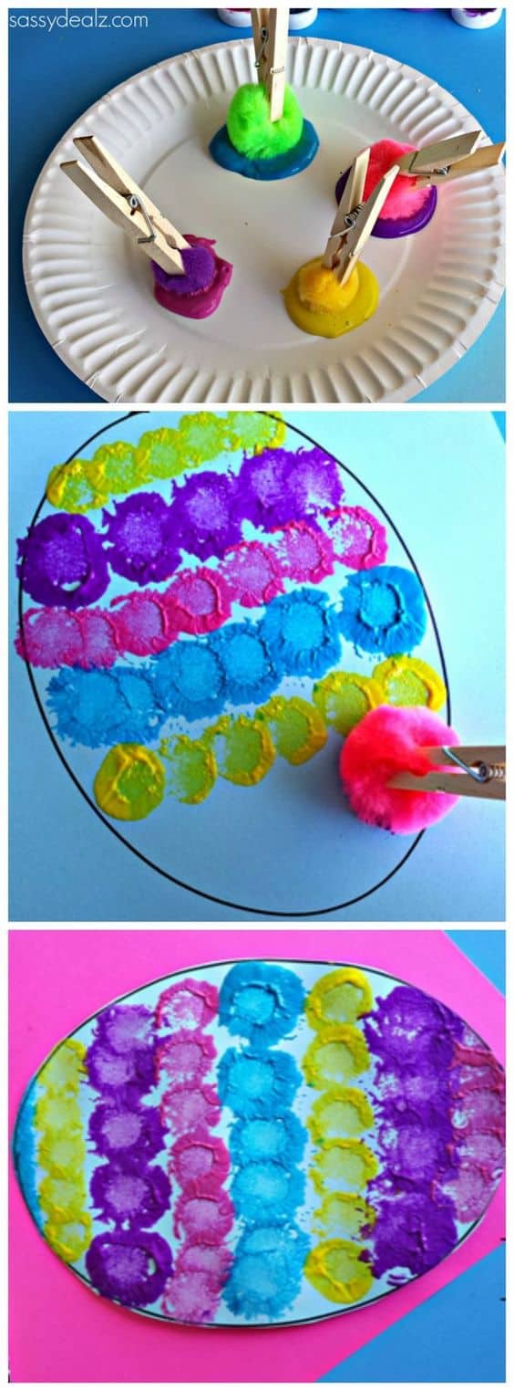 #14 CONSIDER DIPPING COLORED COTTON BALLS HELD BY CLOSE PINS IN VARIOUS DYES TO CREATE VIBRANT SPOTS IN A CUT OUT PAPER EGG