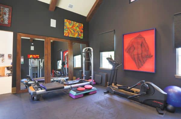 Bring your own artwork in the gym forward with a dark background.