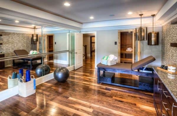 Elegant wooden floors and mirror wall can forge a welcoming ambiance in your home gym.