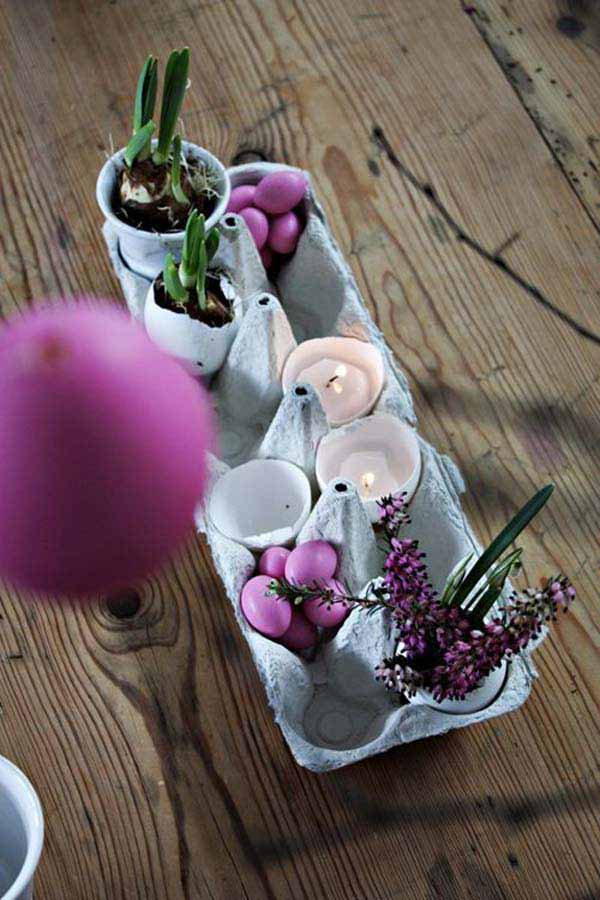 #22 small sensible diy Easter centerpiece containing candles and egg planters