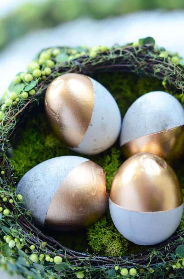 #4 dip concrete eggs into gold paint for a great centerpiece