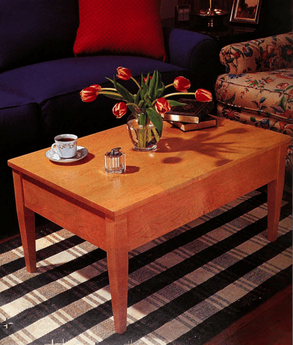 COFFEE TABLE WITH A BUILT-IN STORAGE COMPARTMENT