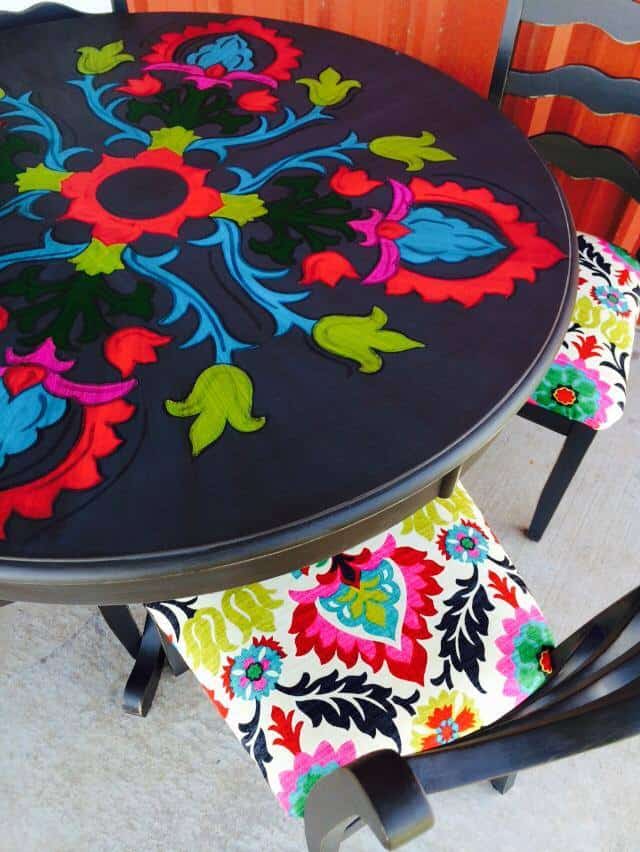 3. COLORFUL HAND-PAINTED SPOOL TABLE