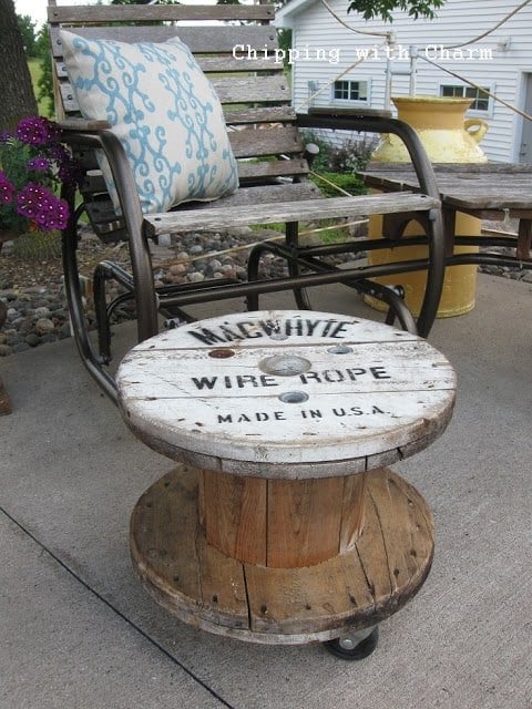 4. A VINTAGE LOOKING SPOOL TABLE DESIGN WITH A FRENCH VIBE