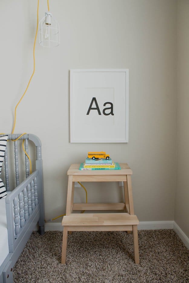 23. USE A SMALL IKEA LADDER AS A NIGHTSTAND