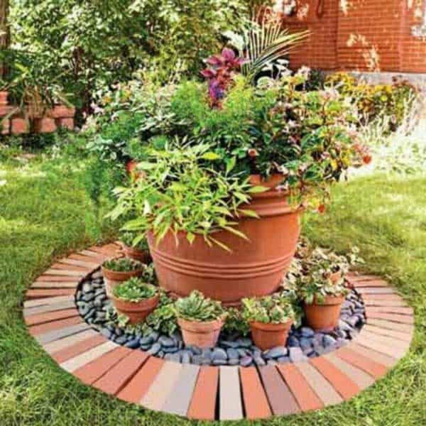 16. use bricks to highlight your garden arrangements