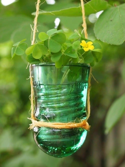 21. use a glass insulator as a flower pot