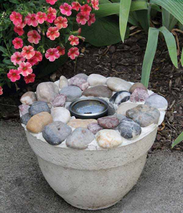 FLOWER-POT SHAPED CONCRETE AND RIVER ROCKS FIRE PIT