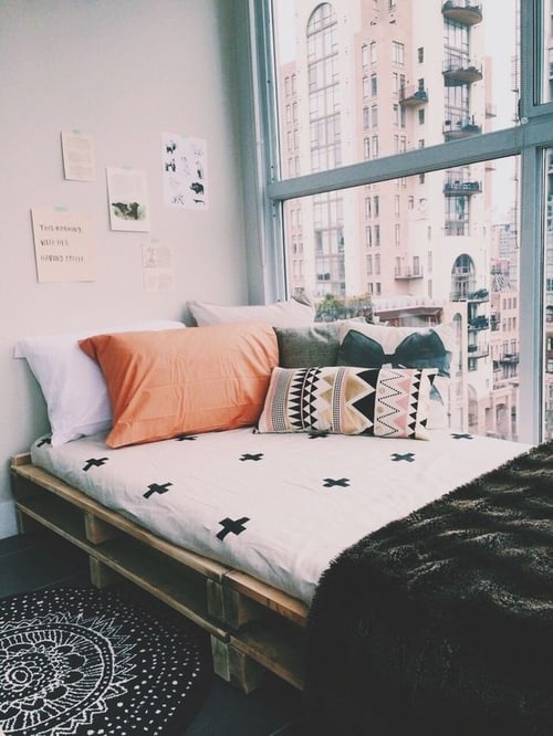 3. NARROW PALLET BED OVERLOOKING THE CITY