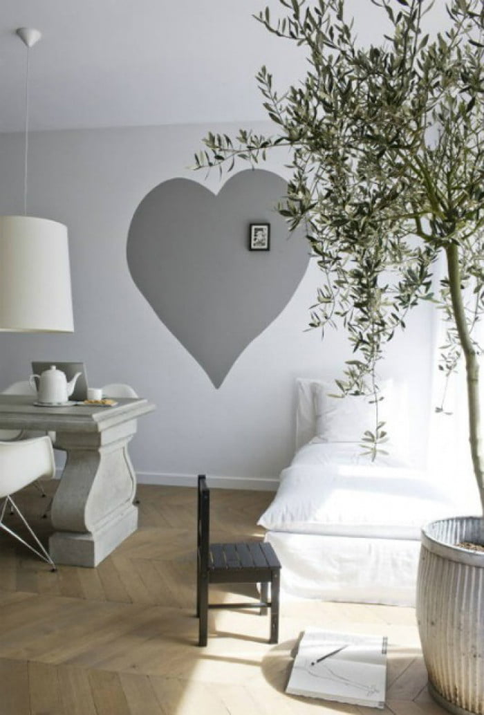 Neutral tones can be balanced with an olive tree