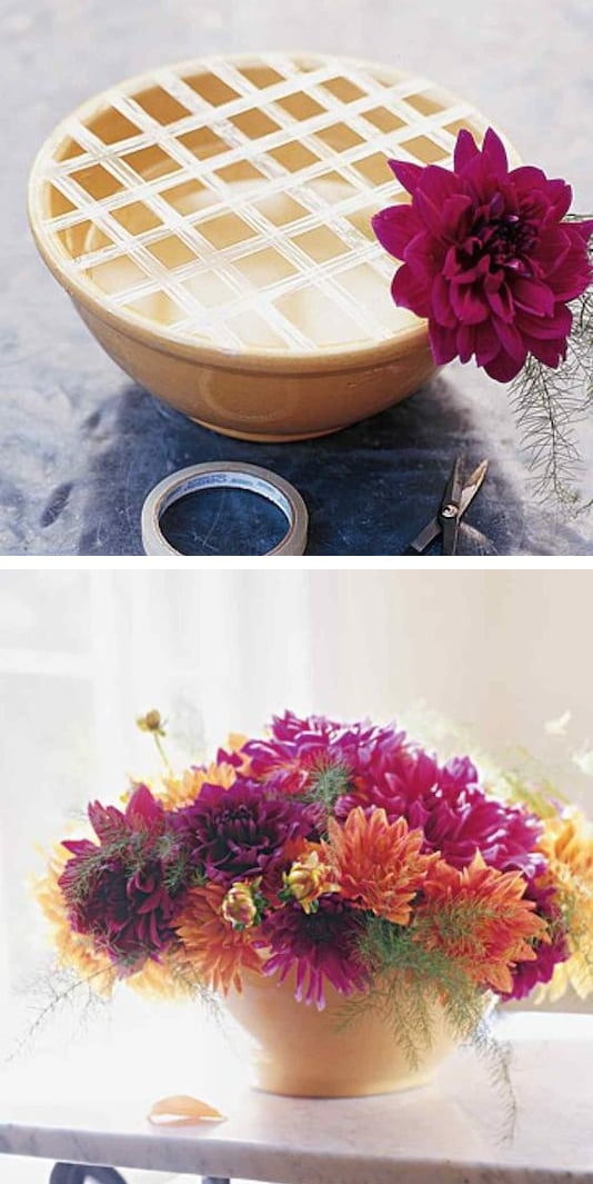1.-Use-a-grid-of-tape-to-keep-your-flowers-in-place.-13-Clever-Flower-Arrangement-Tips-Tricks
