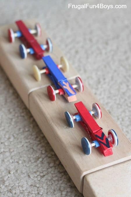 11. USE BUTTONS AND CLOTHESPINS IN RACE-CARS