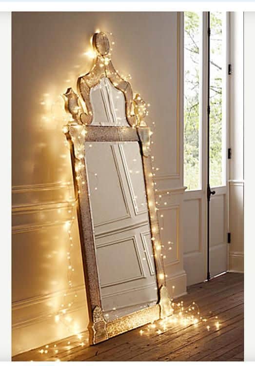 decorate your tall mirror with string lights