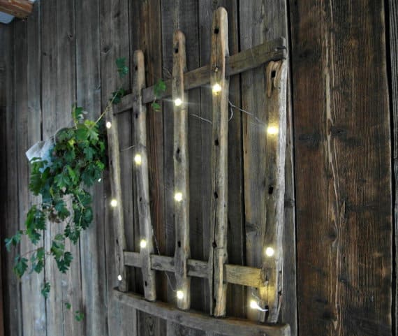 20. USE STRING LIGHTS ON A SIMPLE WOODEN STRUCTURE